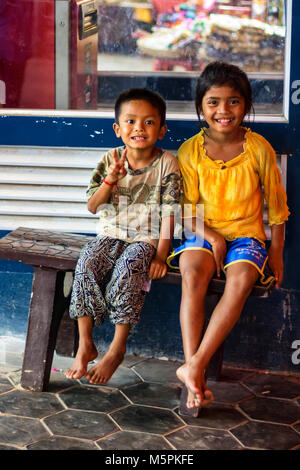 SIEM REAP, CAMBODIA- MARCH 22, 2013: Unidentified smiling Cambodian children Stock Photo