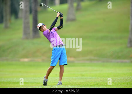 Danau, UKM Bangi - FEBRUARY 11: Isaac To Chern Yi plays his second shot on the 4th hole during Final Round of the Danau Junior Championship Stock Photo