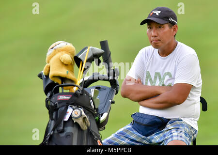 Danau, UKM Bangi - FEBRUARY 11: Megan Lee's father watching her putting on the 18th green during Final Round of the Danau Junior Championship at Danau Stock Photo