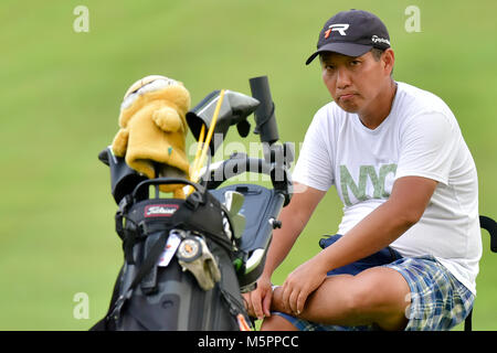 Danau, UKM Bangi - FEBRUARY 11: Megan Lee's father watching her putting on the 18th green during Final Round of the Danau Junior Championship at Danau Stock Photo