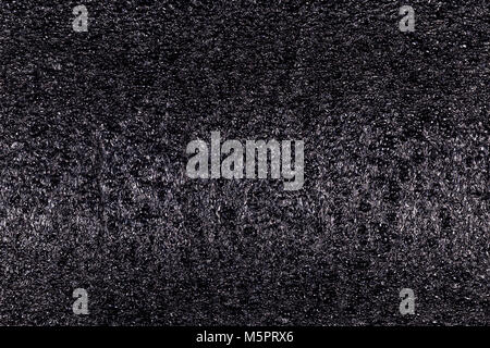 texture of black polystyrene foam, black, close-up Stock Photo