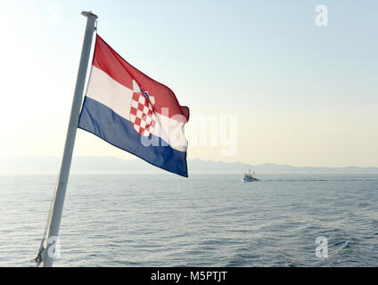 Croatian flag and ship at sea Stock Photo