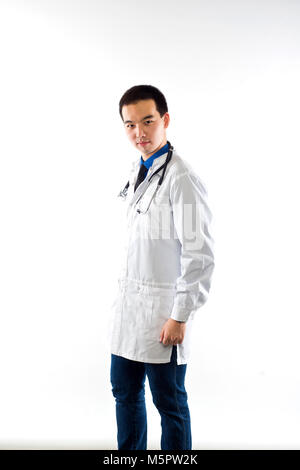 Portrait of friendly Asian male doctor on white. The man the doctor on a white background Stock Photo