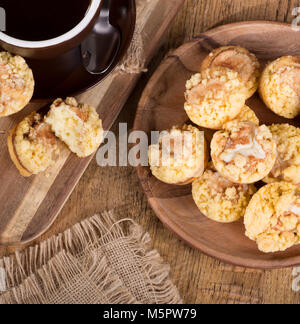 Top view of cinnamon cream cheese coffee cake on a wooden plate Stock Photo