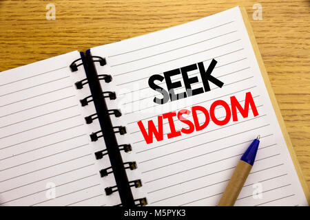 Word, writing Seek Wisdom. Business concept for Inspiration Knowledge written on notepad with space on old wood wooden background with pen marker Stock Photo
