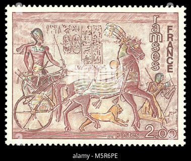 France - stamp 1976: Color edition on Art, shows Ramses at Fresco of the temple of Abu Simbel in Egypt Stock Photo