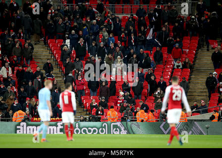 A general view of empty seats in the Arsenal stand during the Carabao Cup Final at Wembley Stadium, London. PRESS ASSOCIATION Photo. Picture date: Sunday February 25, 2018. See PA story SOCCER Final. Photo credit should read: Nick Potts/PA Wire. RESTRICTIONS: No use with unauthorised audio, video, data, fixture lists, club/league logos or 'live' services. Online in-match use limited to 75 images, no video emulation. No use in betting, games or single club/league/player publications. Stock Photo