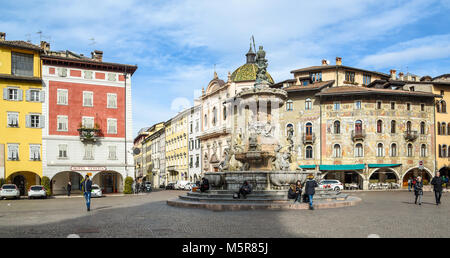 Duomo square with the Fountain of Nettuno, on the background the historical palaces , Trento, Trentino Alto Adige, northern italy Stock Photo