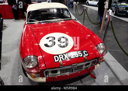 1965 MGB Le Mans second in class, Paddy Hopkirk/Andrew Hedges. Reg DRX 255C.Showing at the Excel, The London classic car show 2018. London, Britain Stock Photo