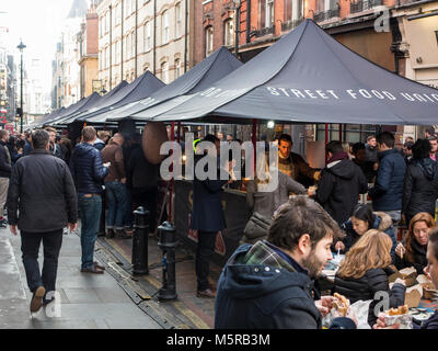 Street vendors selling food to local office staff and shoppers in Soho Stock Photo