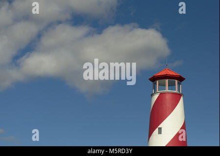Closeup of Red and White Lighthouse Stock Photo
