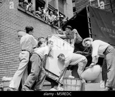 Students of Hebrew Theological College in Chicago moving a kosher kitchen to an off campus location for student project, ca. 1943. Stock Photo