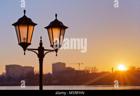 street lamp at dawn, street lighting in the sunset Stock Photo