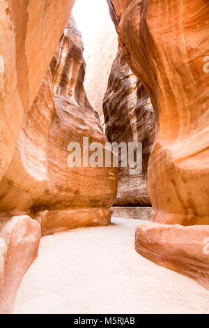 Petra canyon called the Siq that leads to the Nabatean city, Jordan Stock Photo