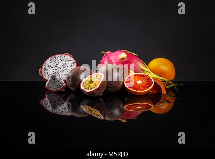 Healthy exotic fruit concept on clipping path black background Stock Photo