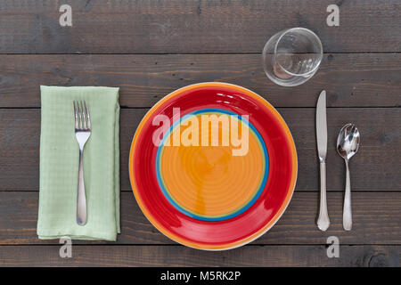 Dining place setting on a rustic wood background Stock Photo