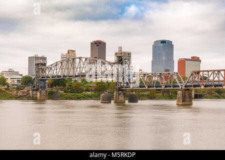 LITTLE ROCK, AR - OCTOBER 11, 2017:  Little Rock Junction Bridge and city skyline from across the Arkansas River Stock Photo