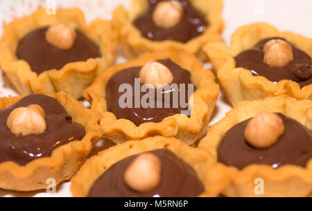 Italy gastronomy basket short pastry  with dark chocolate and hazelnut Stock Photo