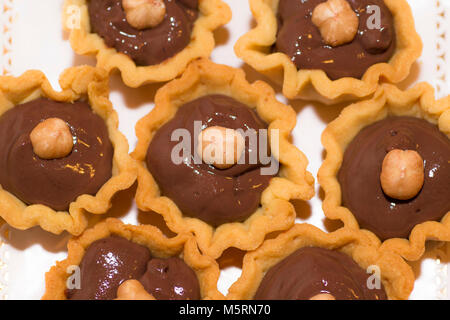 Italy gastronomy basket short pastry  with dark chocolate and hazelnut Stock Photo