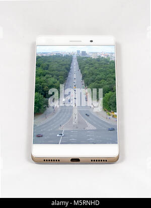Modern smartphone with full screen picture of Berlin, Germany. Concept for travel smartphone photography.All images in this composition are made by me Stock Photo