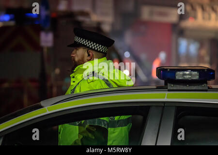 Leicester, UK. 26th Feb, 2018. Police Officer Cordons Off The Road At The Scene Of The Explosion On Hinckley Road In Leicester. Police Officer On Hinckley Road In Leicester Sunday 25th February 2018. Credit: David Morton/Alamy Live News Stock Photo