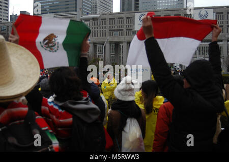 Japan. 25th Feb, 2018. (left) A man of Mexico City holds a flag from Mexico during the Tokyo Marathon 2018 in Tokyo Japan. Sunday February 25, 2018. Photo by: Ramiro Agustn Vargas Tabares Credit: Ramiro Agustin Vargas Tabares/ZUMA Wire/Alamy Live News Stock Photo