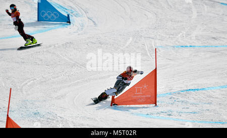 Pyeongchang, Korea, Republic Of. 24th Feb, 2018. Czech snowboarder and skier Ester Ledecka, right and Daniela Ulbing of Austria in action during the parallel giant slalom in snowboarding at the Olympics. PyeongChang, South Korea, February 24, 2018. Credit: Michal Kamaryt/CTK Photo/Alamy Live News Stock Photo