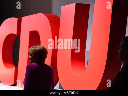 Berlin, Germany. 26th Feb, 2018. German chancellor Angela Merkel (Christain Democratic Party - CDU) arrives for the 30th federal party conference of the CDU. Credit: dpa picture alliance/Alamy Live News Stock Photo