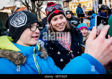 Vrchlabi, Czech Republic. 26th Feb, 2018. Olympic bronze medallist snowboarder Eva Samkova smiles and poses for a selfie photo with her young fan during the celebration with fans in Vrchlabi, Czech Republic, on Monday, February 26, 2018, after the 2018 Winter Olympics in Pyeongchang, South Korea. Credit: David Tanecek/CTK Photo/Alamy Live News Stock Photo