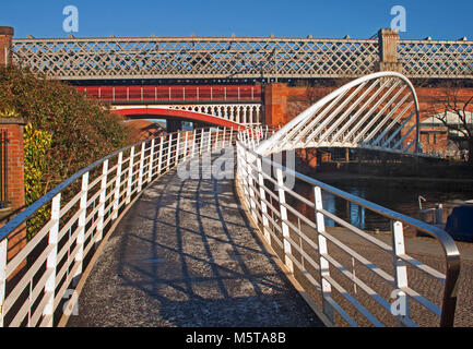 Bridges of Castlefield, Manchester, with Merchant's bridge leading the eye to the historic railway bridge Stock Photo