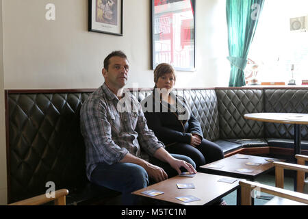 Aidan O'Toole a  survivor of the 1994 gun attack, and Emma Rogan the daughter of Adrian Rogan a victim who was murdered by Loyalist gunmen in 1994 attack sit inside the same room where the gun attack took place in the Bar as it is today. (2 Oct 2012). O'Tooles Bar is the only Pub in the small village of Loughinisland in County Down, Northern Ireland. On 18 June 1994 and The Ulster Volunteer Force (UVF), a loyalist paramilitary group, attacked the crowded pub with assault rifles killing six civilians and wounding five. The pub was targete Stock Photo