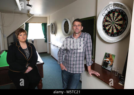 Aidan O'Toole a  survivor of the 1994 gun attack, and Emma Rogan the daughter of Adrian Rogan a victim who was murdered by Loyalist gunmen in 1994 attack stand inside the same room where the gun attack took place in the Bar as it is today. (2 Oct 2012). Aidan O'Toole stands in the same spot where he was on the night of the gun attack. Once the main Bar area, today, the room has been turned into a loung and pool room.  O'Tooles Bar is the only Bar in the small village of Loughinisland in County Down, Northern Ireland. On 18 June 1994 and Stock Photo