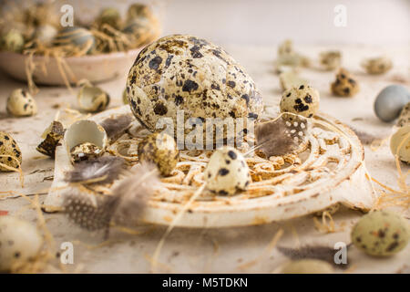 Various decorative Easter eggs and a French vintage coaster Stock Photo