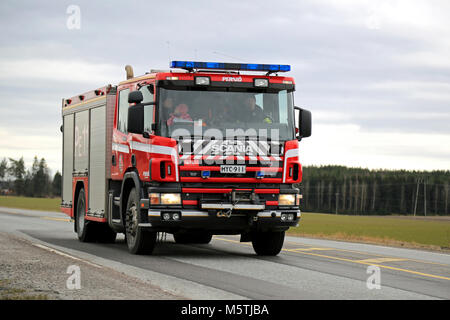 SALO, FINLAND - MARCH 22, 2015: Scania Fire truck on highway 52. A traditional Scania water-rescue tender is typically built in a 4x2 or 4x4 configura Stock Photo