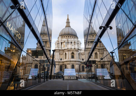 St Paul's Cathedral reflections in the glass windows of One New Change shopping centre Stock Photo