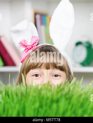 Little girl dressed in bunny ears Stock Photo