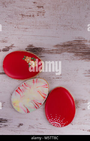 Easter gingerbread cookies on wooden table. Eggs. Greeting card. View from above.Copy space. Stock Photo