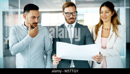 Group of architects working on project Stock Photo