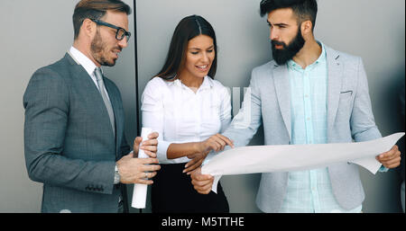 Group of architects working on project Stock Photo