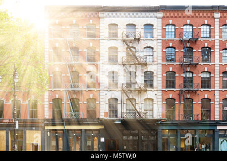 Sunlight shines on buildings in the Tribeca neighborhood of Manhattan, New York City Stock Photo