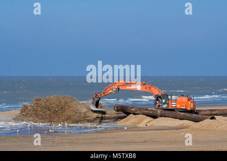 Hitachi Zaxis 470 LCH, crawler hydraulic excavator used by Dredging and Marine Works Jan De Nul for sand replenishment / beach nourishment at Ostend Stock Photo