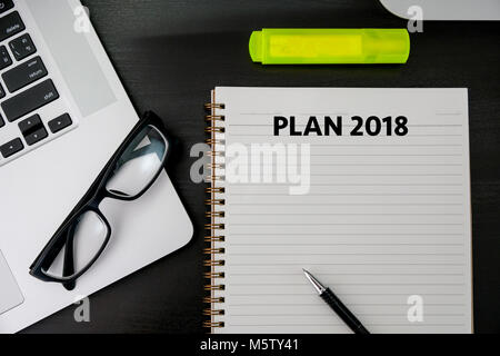 Plan 2018 Notebook business team meeting  with an Plan 2018 Stock Photo