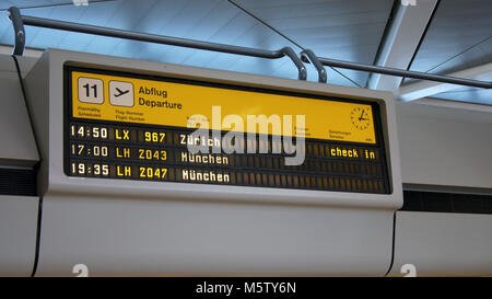 BERLIN, GERMANY - MAR 31st, 2015: A split-flap display at the Berlin Tegel Airport, TXL departure board Stock Photo