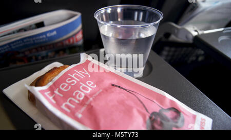 BERLIN, GERMANY - MAR 31st, 2015: freshly made pastry as an in flight meal on board an european airline Stock Photo