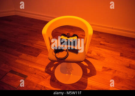 chairs laid out for an exhibition of virtual reality art work in a gallery Stock Photo