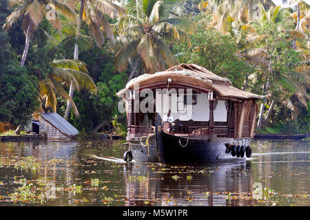 Sailing on a houseboat on the backwaters near Alleppey and Kumarakom in Kerala, India. Stock Photo