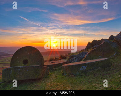 spectacular sunset over the millstones at Stanage Edge near Hathersage, Peak District National Park, Derbyshire Stock Photo