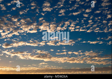 Alltocumulus clouds sunset light with natural sky patterns Stock Photo