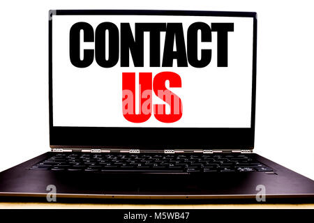 Handwritten text showing Contact Us. Business concept writing for Customer Support Written on monitor front screen, white background with space view. Stock Photo