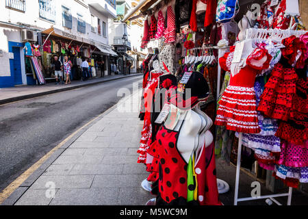 Street view, typical andalusian dress flamenco store souvenir in Torremolinos,Spain. Stock Photo